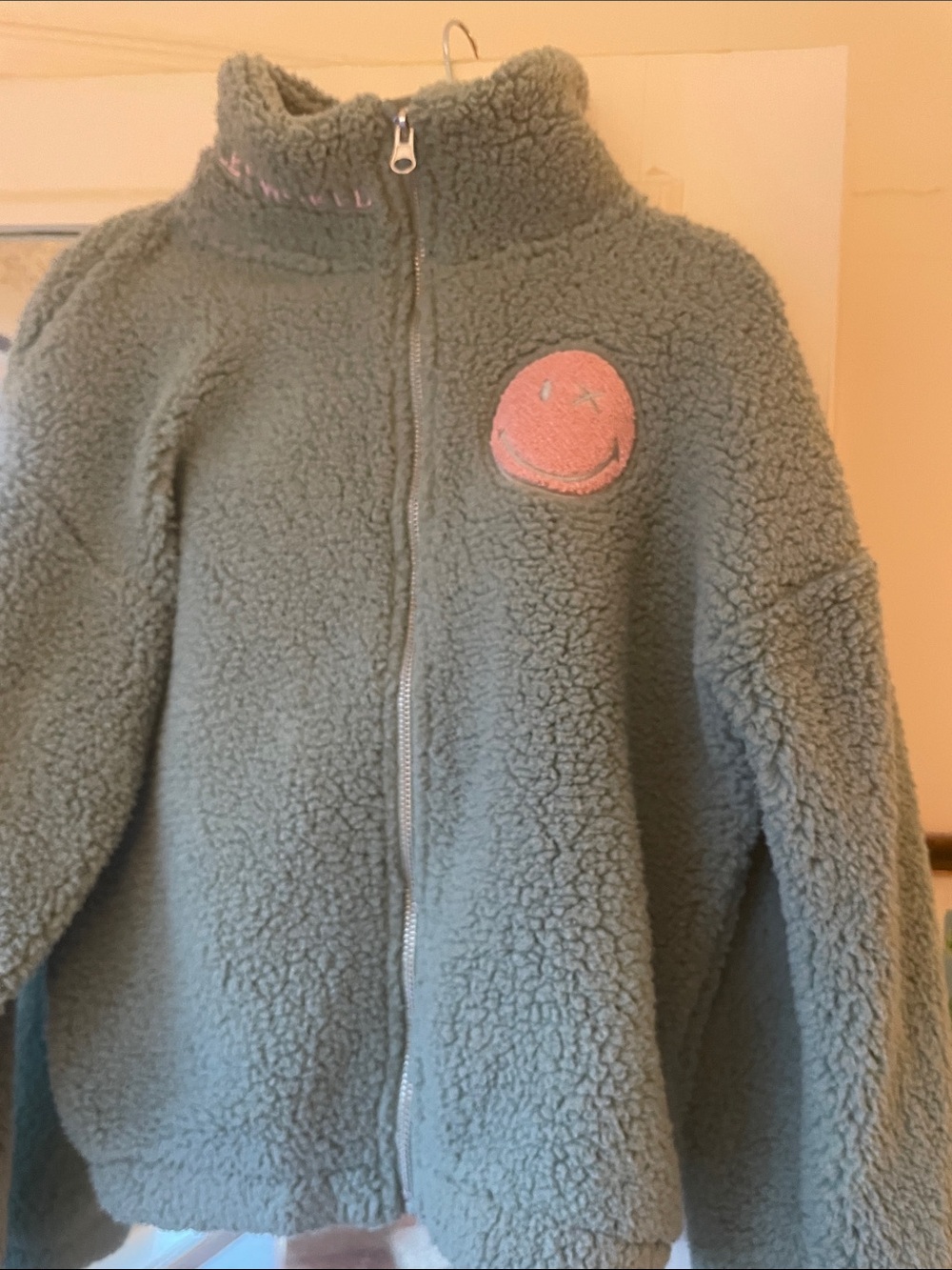 H&M Sage Green Plush Zip-Up Jacket with Pink Smiley Patch
